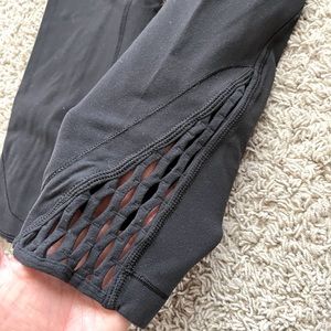 Lululemon black crop leggings with cut-outs 21” inseam